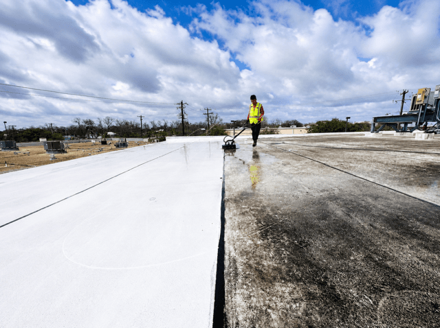 Clean and dirty sections of a commercial TPO roof side by side